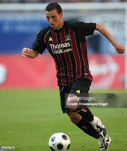 Elano of Manchester City running with the ball during a pre season friendly match between Hamburger SV and Manchester City at the HSH Nordbank Arena...