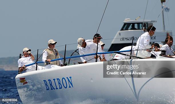 King Juan Carlos of Spain stands on board the yacht 'Bribon' during the second day of The 27th Copa del Rey Mapfre Audi Sailing Cup on July 29, 2008...