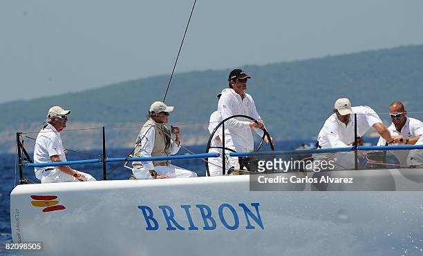 King Juan Carlos of Spain stands on board the yacht 'Bribon' during the second day of The 27th Copa del Rey Mapfre Audi Sailing Cup on July 29, 2008...