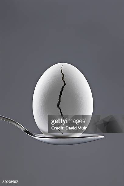 egg with  - crack spoon stock pictures, royalty-free photos & images