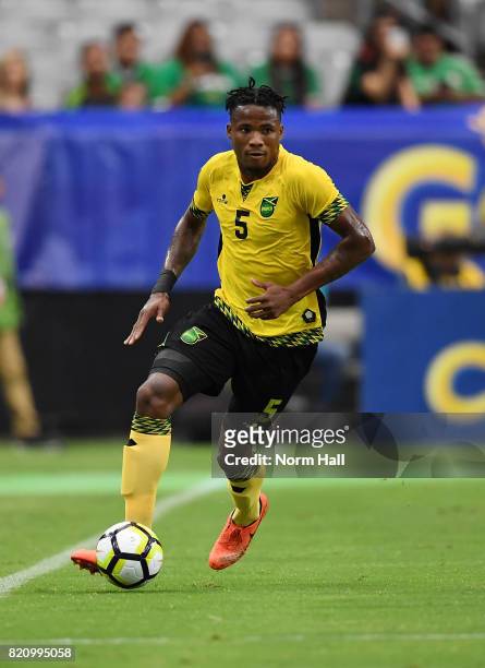 Alvas Powell of Jamaica controls the ball against Canada in a quarterfinal match during the CONCACAF Gold Cup at University of Phoenix Stadium on...