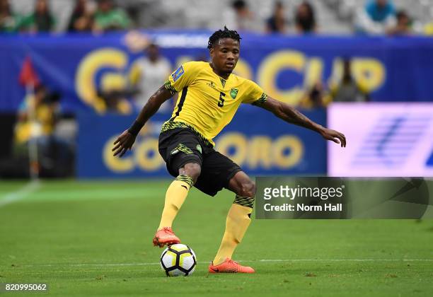 Alvas Powell of Jamaica controls the ball against Canada in a quarterfinal match during the CONCACAF Gold Cup at University of Phoenix Stadium on...
