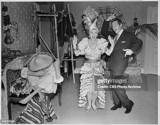 American actress Lucille Ball and her husband, Cuban actor Desi Arnaz dance backstage on the set of 'I Love Lucy,' Los Angeles, California, September...