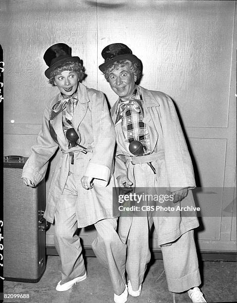 American actress Lucille Ball and American comedian Harpo Marx appear in an episode of 'I Love Lucy,' Los Angeles, California, March 24, 1955. The...