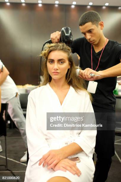 Model prepares backstage at SWIMMIAMI Gottex Cruise 2018 Fashion Show at WET Deck at W South Beach on July 22, 2017 in Miami Beach, Florida.