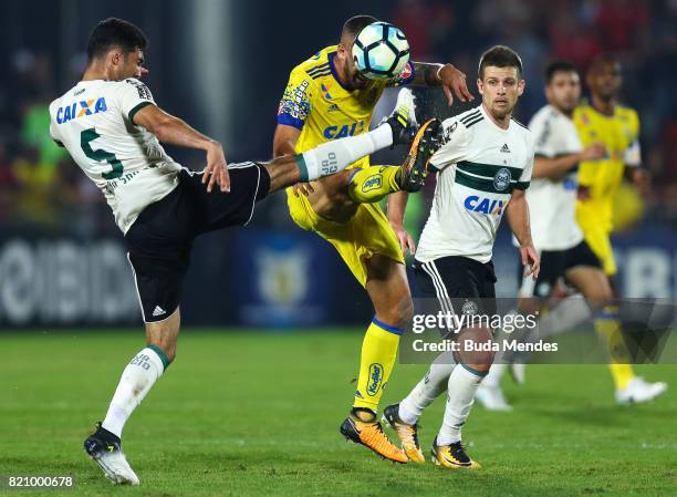 Romulo of Flamengo struggles for the ball with Alan Santos of Coritiba during a match between Flamengo and Coritiba as part of Brasileirao Series A...