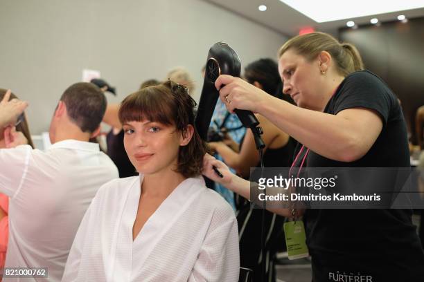 Model prepares backstage at SWIMMIAMI Gottex Cruise 2018 Fashion Show at WET Deck at W South Beach on July 22, 2017 in Miami Beach, Florida.
