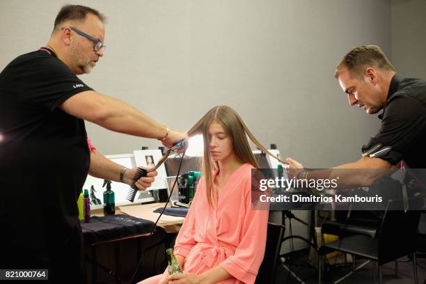 Model prepares backstage at SWIMMIAMI Gottex Cruise 2018 Fashion Show at WET Deck at W South Beach on July 22, 2017 in Miami Beach, Florida.