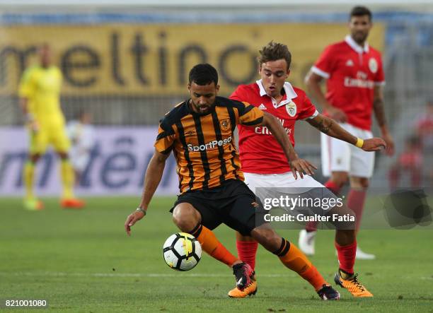 Hull City midfielder Kevin Stewart with Benfica's midfielder Andre Horta from Portugal in action during the Algarve Cup match between SL Benfica and...