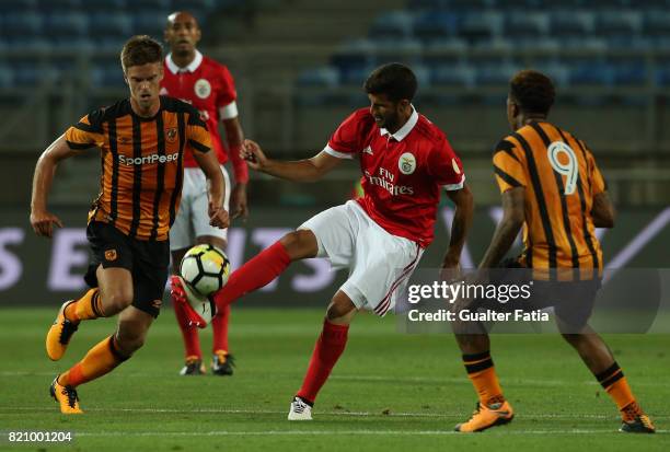 Benfica's defender Lisandro Lopez from Argentina with Hull City midfielder Markus Henriksen and Hull City forward Abel Hernandez in action during the...