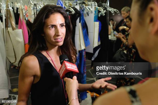 Designer Annie Markson prepares backstage at SWIMMIAMI Gottex Cruise 2018 Fashion Show at WET Deck at W South Beach on July 22, 2017 in Miami Beach,...