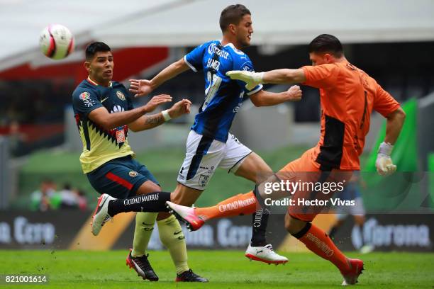 Tiago Volpi goalkeeper of Queretaro kicks off the ball as Silvio Romero of America and Hiram Mier of Querataro run during the 1st round match between...