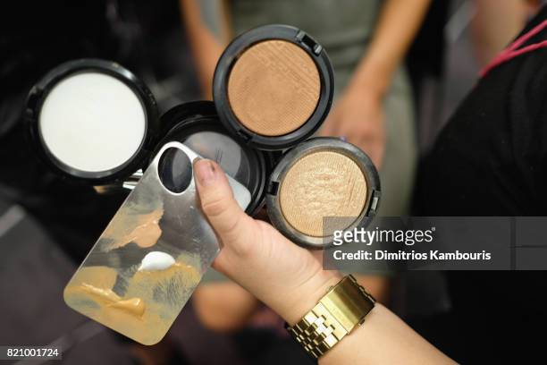 View of make-up as a model prepares backstage at SWIMMIAMI Gottex Cruise 2018 Fashion Show at WET Deck at W South Beach on July 22, 2017 in Miami...