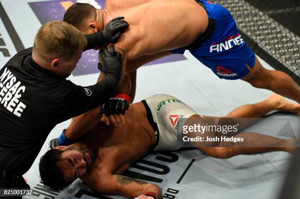 Eryk Anders punches Rafael Natal of Brazil in their middleweight bout during the UFC Fight Night event inside the Nassau Veterans Memorial Coliseum...