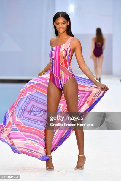 Model walks the runway at SWIMMIAMI Gottex Cruise 2018 Fashion Show at WET Deck at W South Beach on July 22, 2017 in Miami Beach, Florida.