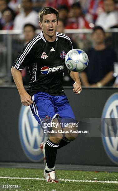Jim Brennan dribbles the ball during the 2008 Pepsi MLS All-Star Game between the MLS All-Stars and West Ham United at BMO Field on July 24, 2008 in...