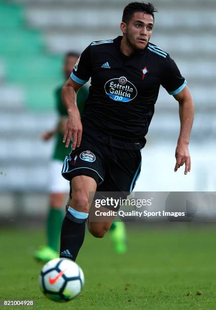 Maximiliano Gomez of Celta de Vigo runs with the ball during the pre-season friendly match between Celta de Vigo and Racing de Ferrol at A Malata...