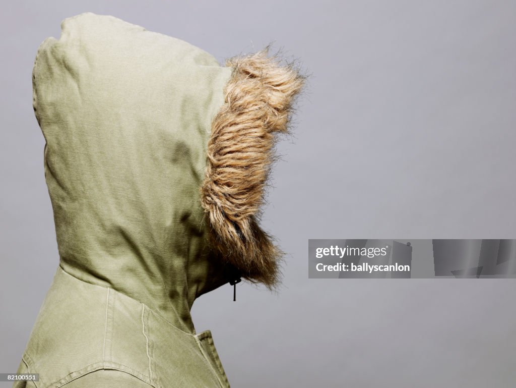 Young asian woman wearing a winter coat