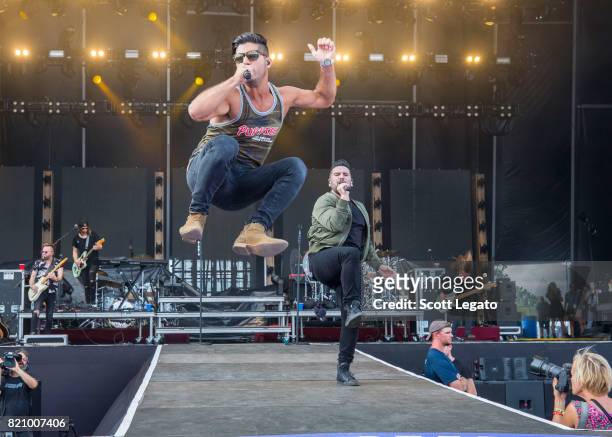 Dan Smyers and Shay Mooney of Dan + Shay perform during day 2 of Faster Horses Festival at Michigan International Speedway on July 22, 2017 in...