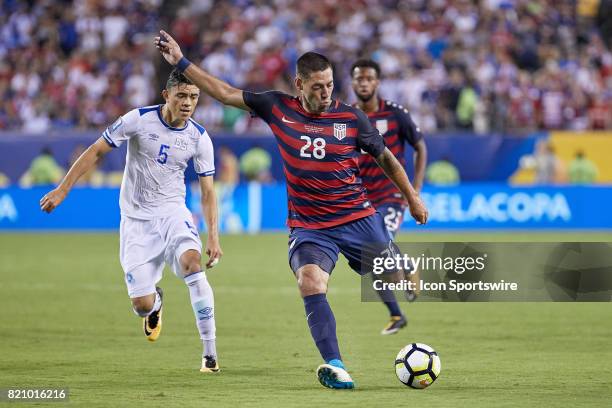 United States forward Clint Dempsey takes a shot on goal during a CONCACAF Gold Cup Quarterfinal match between the United States v El Salvador at...