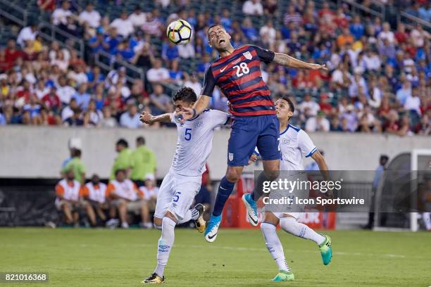 United States forward Clint Dempsey battles with El Salvador defender Ivan Mancia for a header during a CONCACAF Gold Cup Quarterfinal match between...