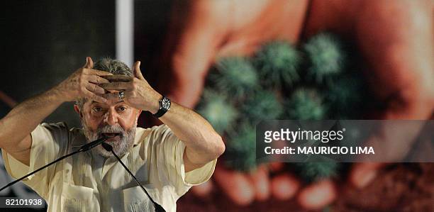 Brazil's President Luiz Inacio Lula da Silva gestures as he delivers a speech during the inauguration of the first biofuel production plant, at...