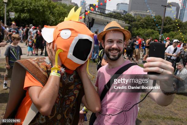 Attendees in Pokemon cosplay attend the Pokemon GO Fest at Grant Park on July 22, 2017 in Chicago, Illinois.