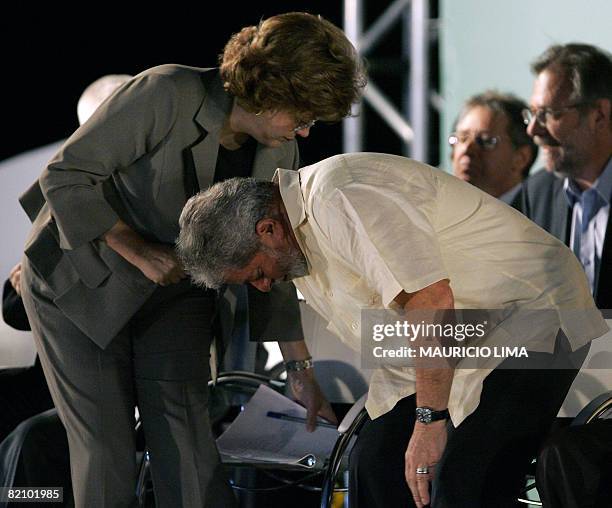 Brazil's President Luiz Inacio Lula da Silva and Chief of Staff Dilma Roussef take their seats during the inauguration of the first biofuel...