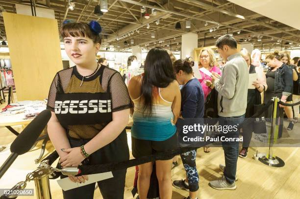 Fan Stella Phillips of Seattle waits in line for actress Rebel Wilson at Nordstrom Downtown Seattle on July 22, 2017 in Seattle, Washington. Rebel...