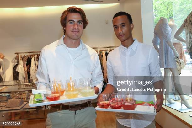 Guy Macchia and Eric Ishman attend an Edie Parker Pop-Up at Intermix hosted by Editor-in-Chief, Samantha Yanks and Designer Brett Heyman on July 22,...