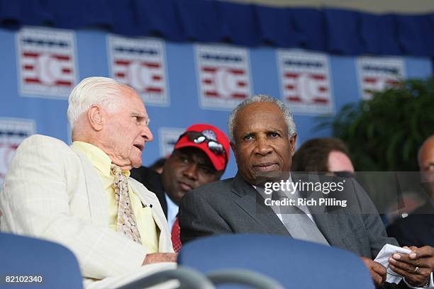 Frank Robinson, right and Bobby Doerr during the Hall of Fame Induction ceremonies at the Clark Sports Center in Cooperstown, New York on July 27,...