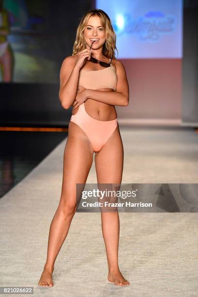 Model walks the runway during SWIMMIAMI Sports Illustrated Swimsuit 2018 Collection at WET Deck at W South Beach on July 22, 2017 in Miami Beach,...