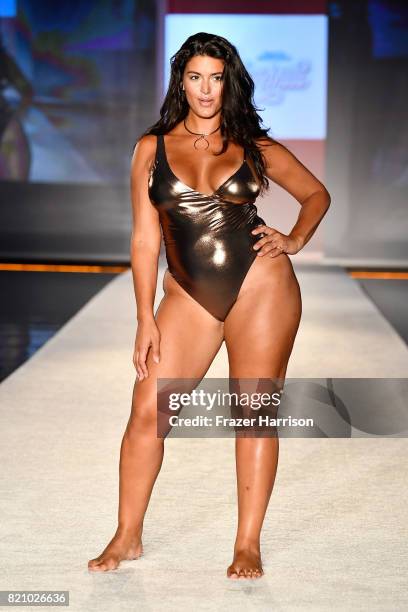 Model walks the runway during SWIMMIAMI Sports Illustrated Swimsuit 2018 Collection at WET Deck at W South Beach on July 22, 2017 in Miami Beach,...