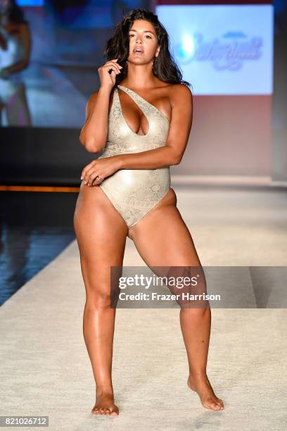Model walks the runway during SWIMMIAMI Sports Illustrated Swimsuit 2018 Collection at WET Deck at W South Beach on July 22, 2017 in Miami Beach,...