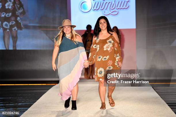 Holly Swope and models walk the runway during SWIMMIAMI Sports Illustrated Swimsuit 2018 Collection at WET Deck at W South Beach on July 22, 2017 in...