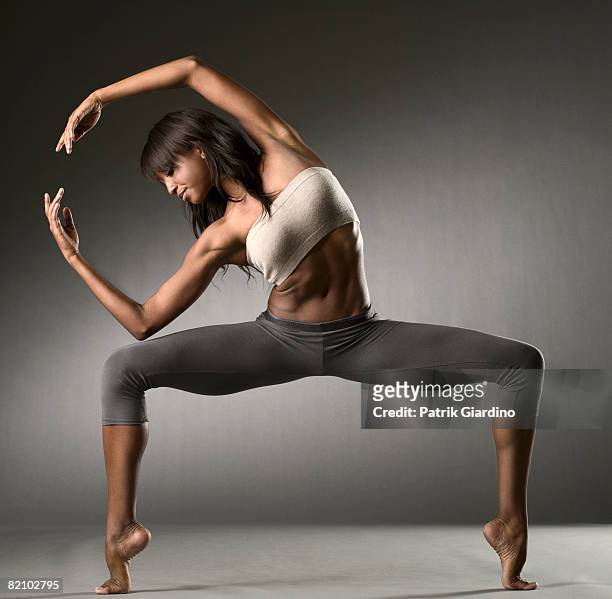 female dancing - legs spread stock-fotos und bilder