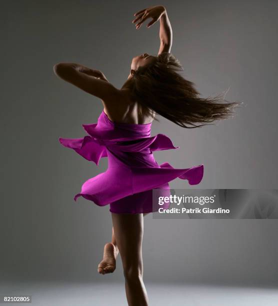 female dancing - woman twirling stock pictures, royalty-free photos & images