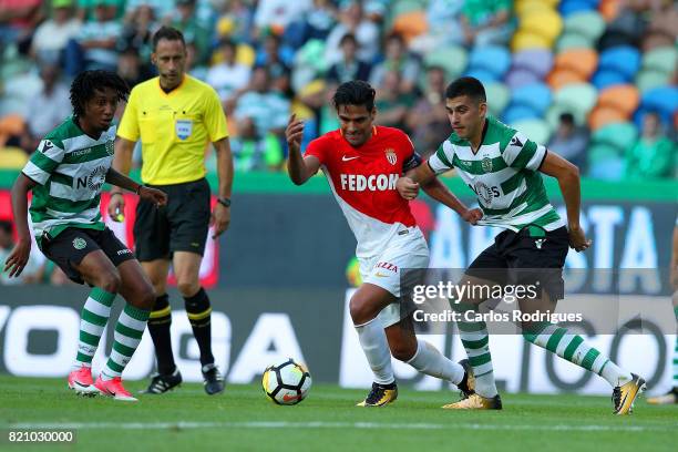 Monaco forward Radamel Falcao from Colombia vies with Sporting CP midfielder Rodrigo Battaglia from Argentina during the Friendly match between...