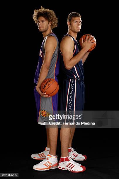 Brook Lopez of the New Jersey Nets and Robin Lopez of the Phoenix Suns pose for a portrait during the 2008 NBA Rookie Photo Shoot on July 29, 2008 at...