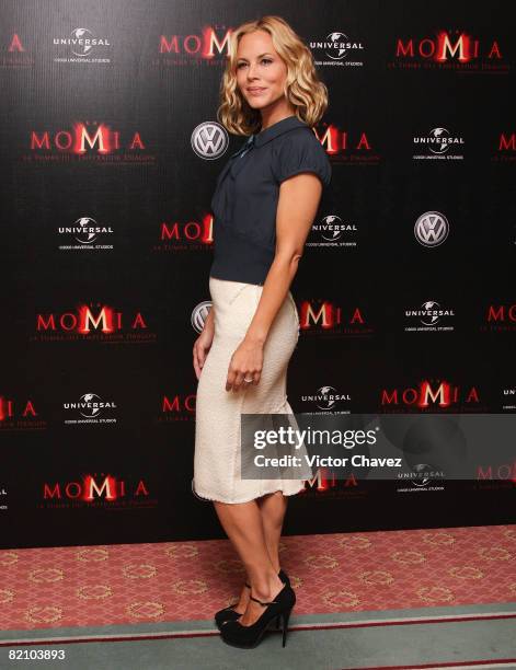 Actress Maria Bello poses for photographers during a photocall to promote the film "The Mummy: Tomb of the Dragon Emperor" at Four Seasons Hotel on...