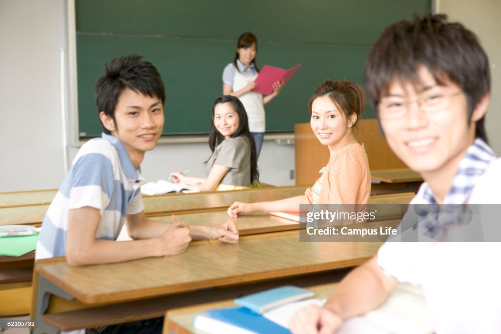 Good Looking Inclass Five Students In Class Looking Back High-Res Stock Photo - Getty Images