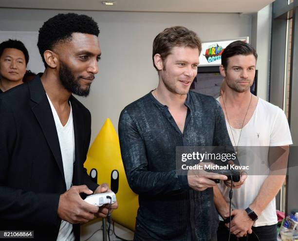 Actors Yusuf Gatewood, Joseph Morgan, and Riley Voelkel from the CW series "The Originals" stopped by Nintendo at the TV Insider Lounge to check out...