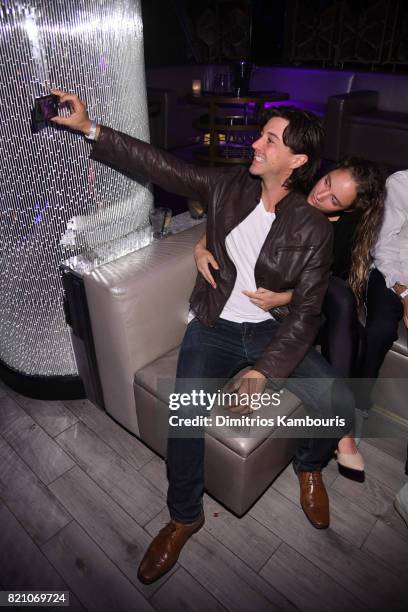 Guests attend the SWIMMIAMI Minimale Animale 2018 Collection fashion show at Ora Nightclub on July 22, 2017 in Miami Beach, Florida.