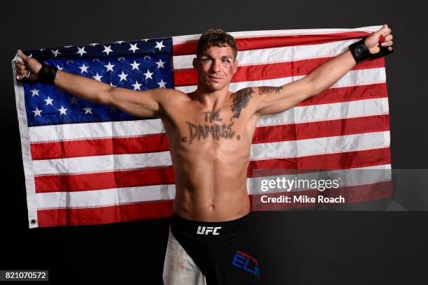 Darren Elkins poses for a post fight portrait backstage during the UFC Fight Night event inside the Nassau Veterans Memorial Coliseum on July 22,...