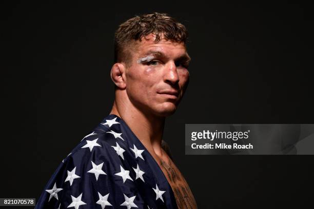 Darren Elkins poses for a post fight portrait backstage during the UFC Fight Night event inside the Nassau Veterans Memorial Coliseum on July 22,...