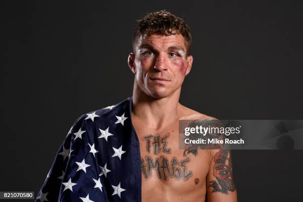 Darren Elkins poses for a post fight portrait backstage during the UFC Fight Night event inside the Nassau Veterans Memorial Coliseum on July 22,...