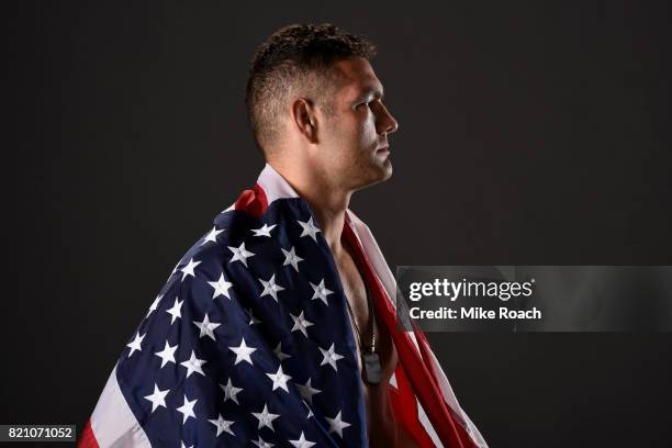 Chris Weidman poses for a post fight portrait backstage during the UFC Fight Night event inside the Nassau Veterans Memorial Coliseum on July 22,...