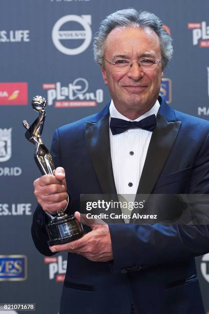 Actor Oscar Martinez receives the receives the 'Best Ator' award for the movie 'for the movie 'El Ciudadano Ilustre'' during the 'Platino Awards...