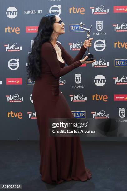Actress Sonia Braga receives the 'Best Actress' award for the movie 'Aquarius' during the 'Platino Awards 2017' at La Caja Magica on July 22, 2017 in...