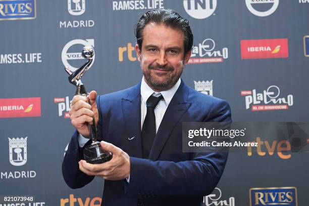 Lorenzo Vigas receives the 'Best Opera Prima' award for the movie 'Desde Alla' during the 'Platino Awards 2017' at La Caja Magica on July 22, 2017 in...